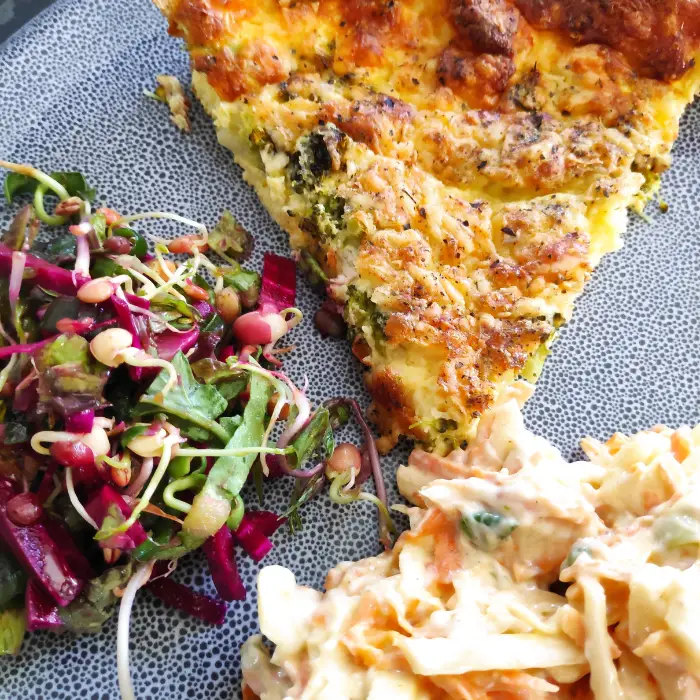 crustless brocolli quiche with coleslaw and salad