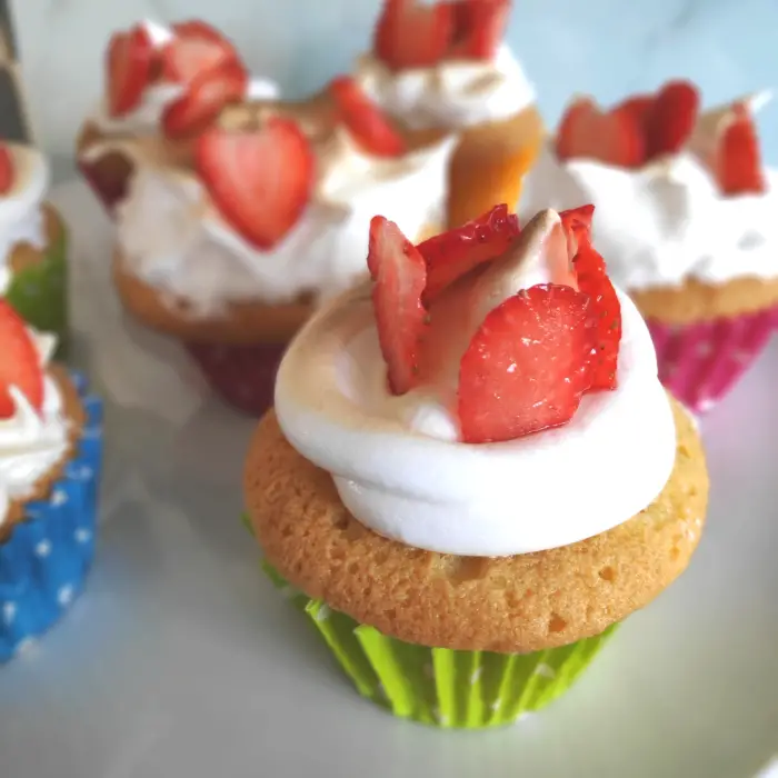 lemon meringue cupcake with fresh strawberries