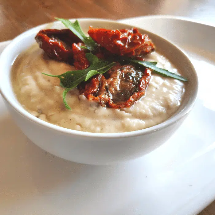 lemon butter bean dip with sun-dried tomatoes and rocket