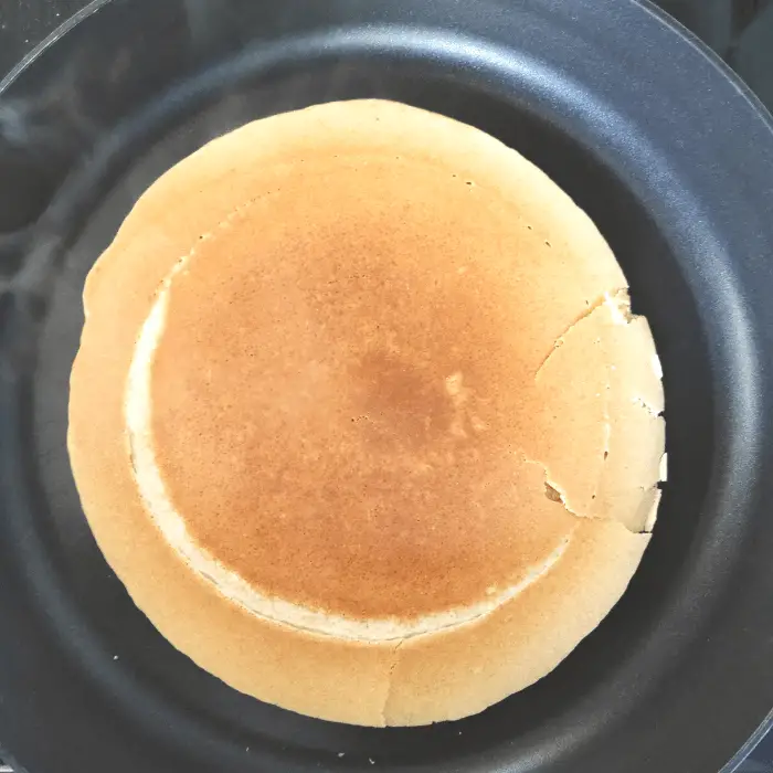 one side of pancake cooked