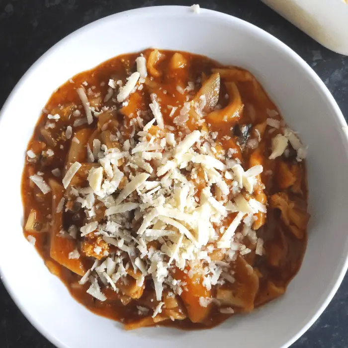 crock pot pasta in tomato sauce with cheese on top