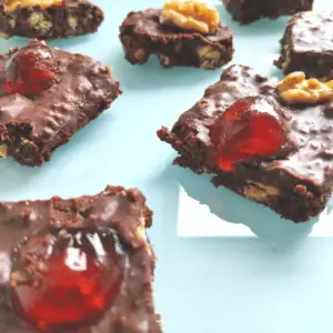chocolate brandy cake squares with cherries and walnuts