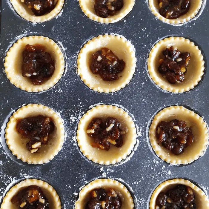 pastry in bun tin filed with mincemeat uk