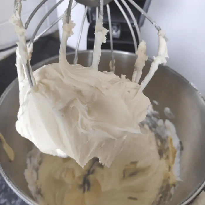 whisking the buttercream ingredients together