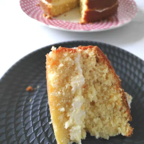 slice of coconut cake with coconut buttercream