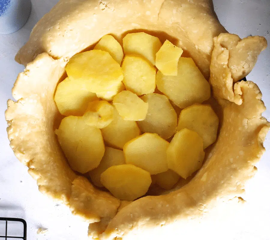 layer of potatoes on pastry