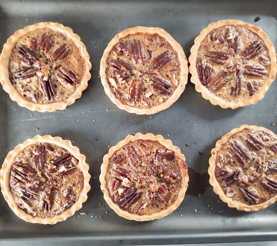 syrup mixture added to mini pecan pies