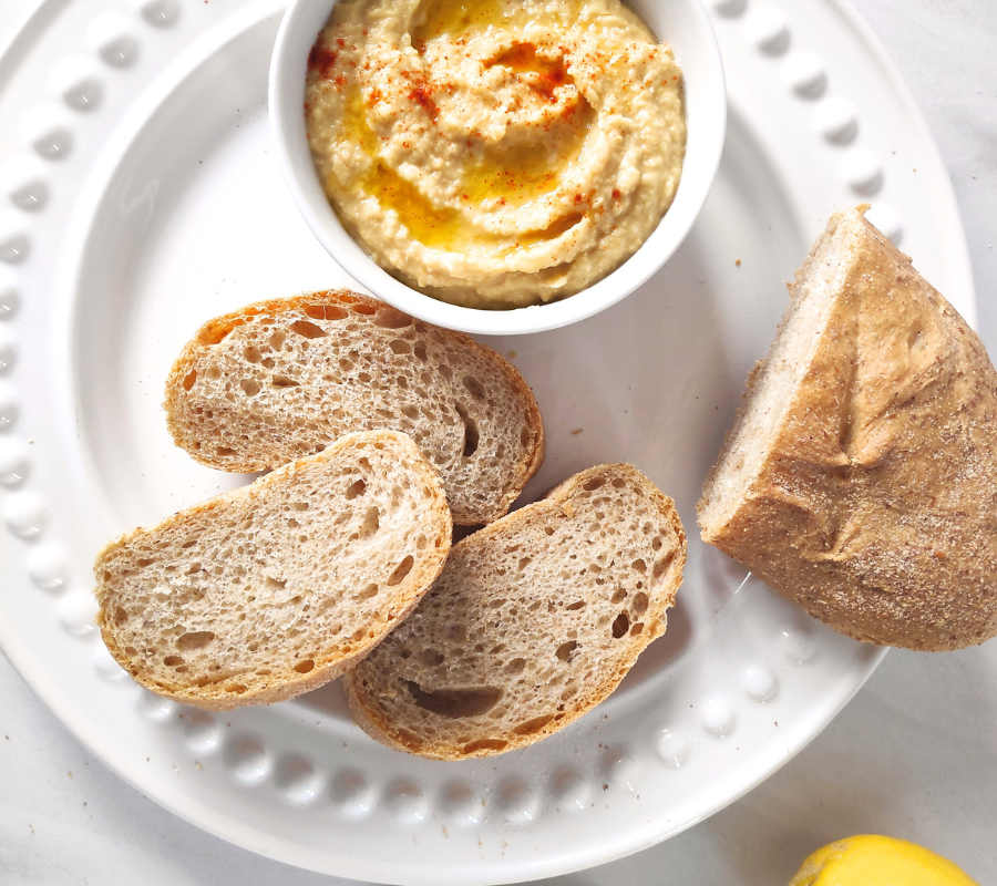sliced baguette with houmous dip