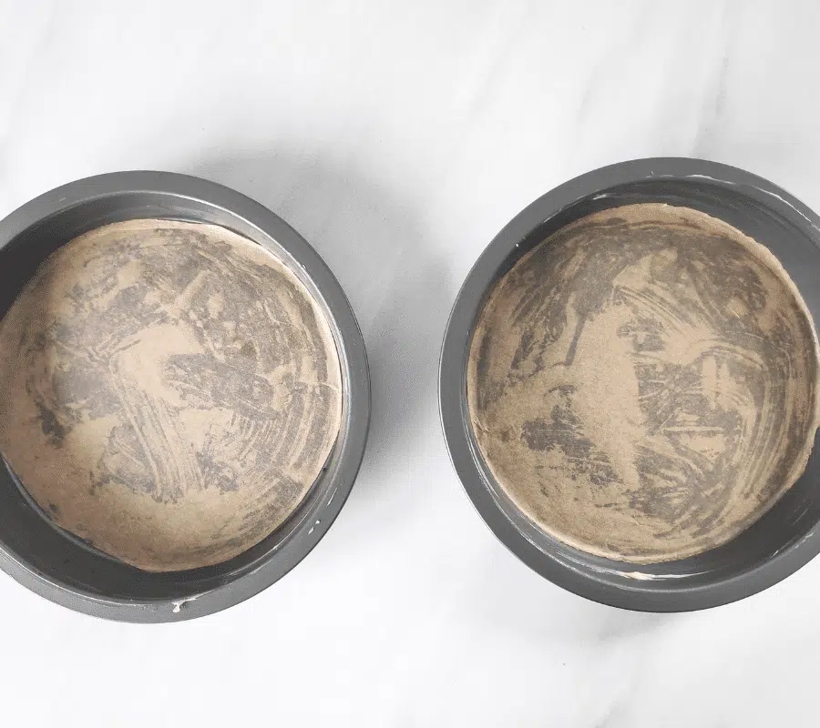Grease and line 2 sandwich tins with baking paper