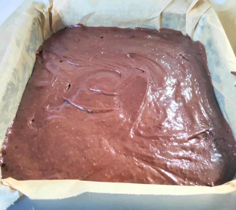 Brownie mixture in brownie tin