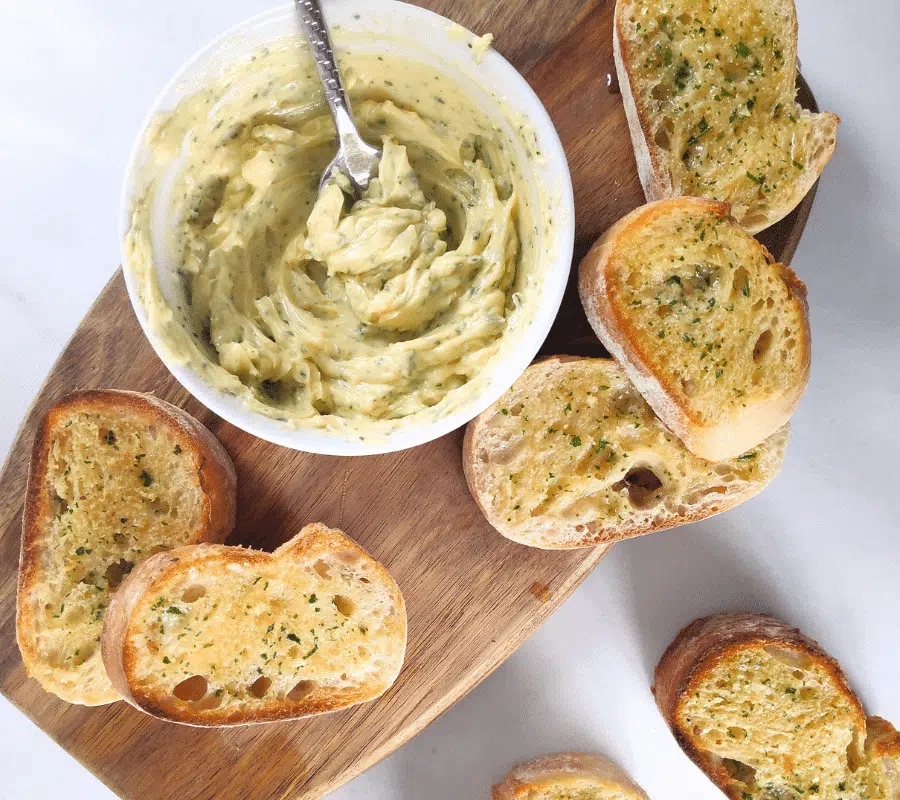 garlic butter spread with toasted baguette slices