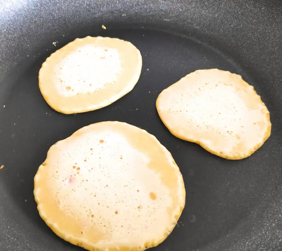 mini pancakes in frying pan