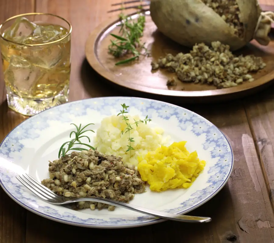 Scottish meal haggis with mashed potatoes and mashed turnips