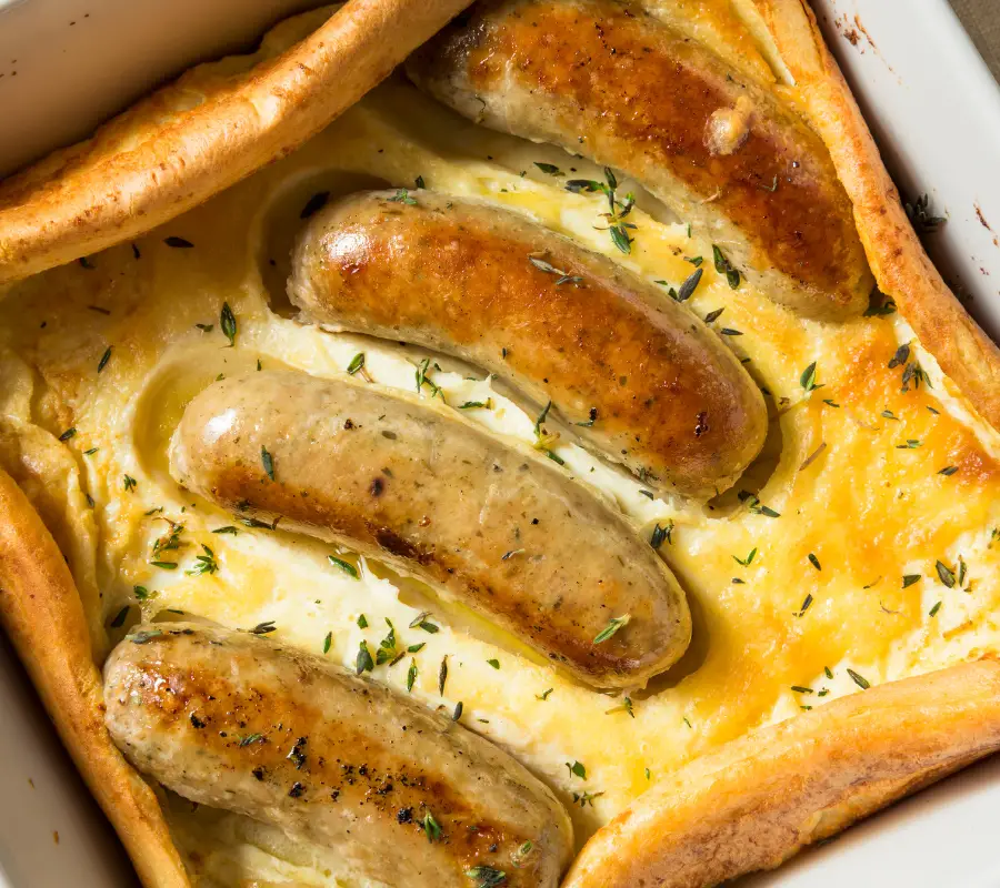 UK national dish toad in the hole - sausages baked in a big Yorkshire oudding