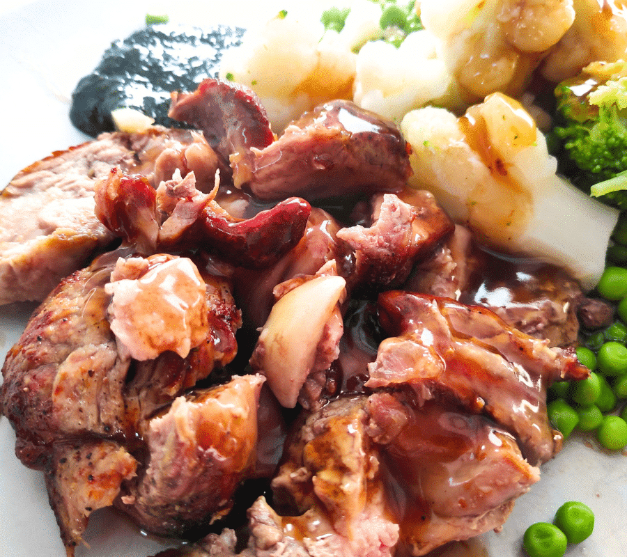 cooked lamb shoulder roast dinner with gravy