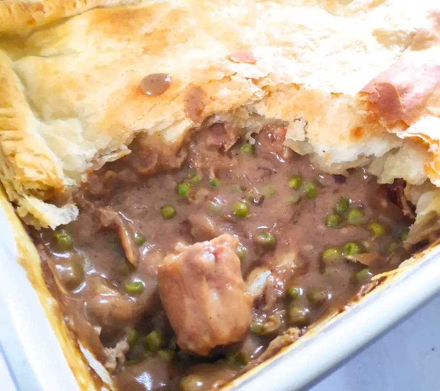 sausage curry pie topped with puff pastry