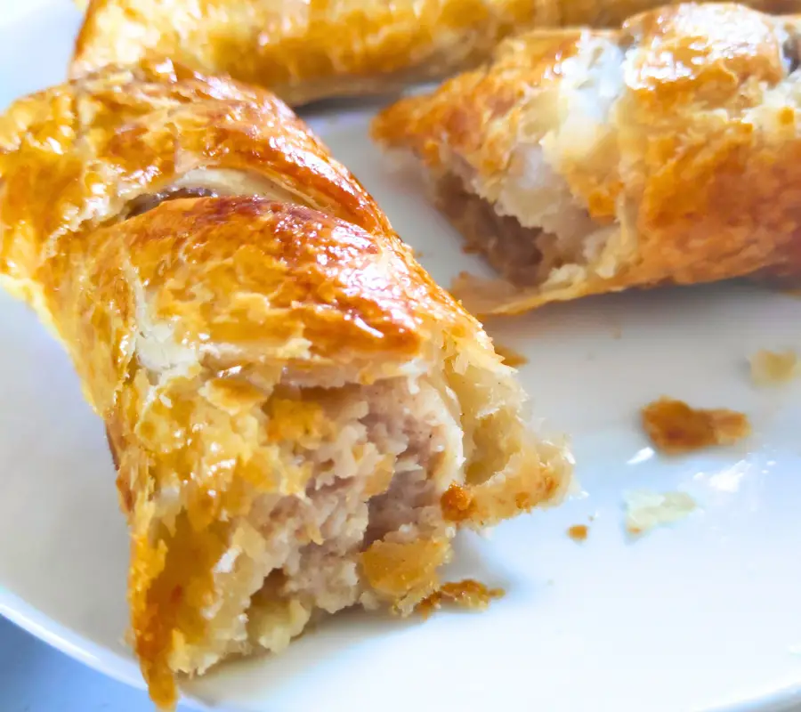 homemade sausage rolls wrapped in puff pastry
