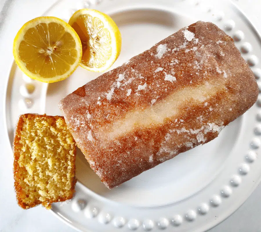 lemon drizzle cake on white plate