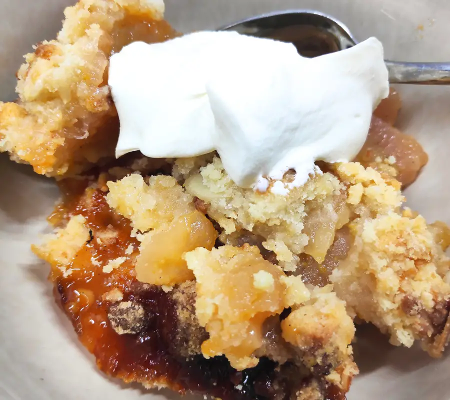 quince marzipan crumble with a dollop of crème fraiche on top.