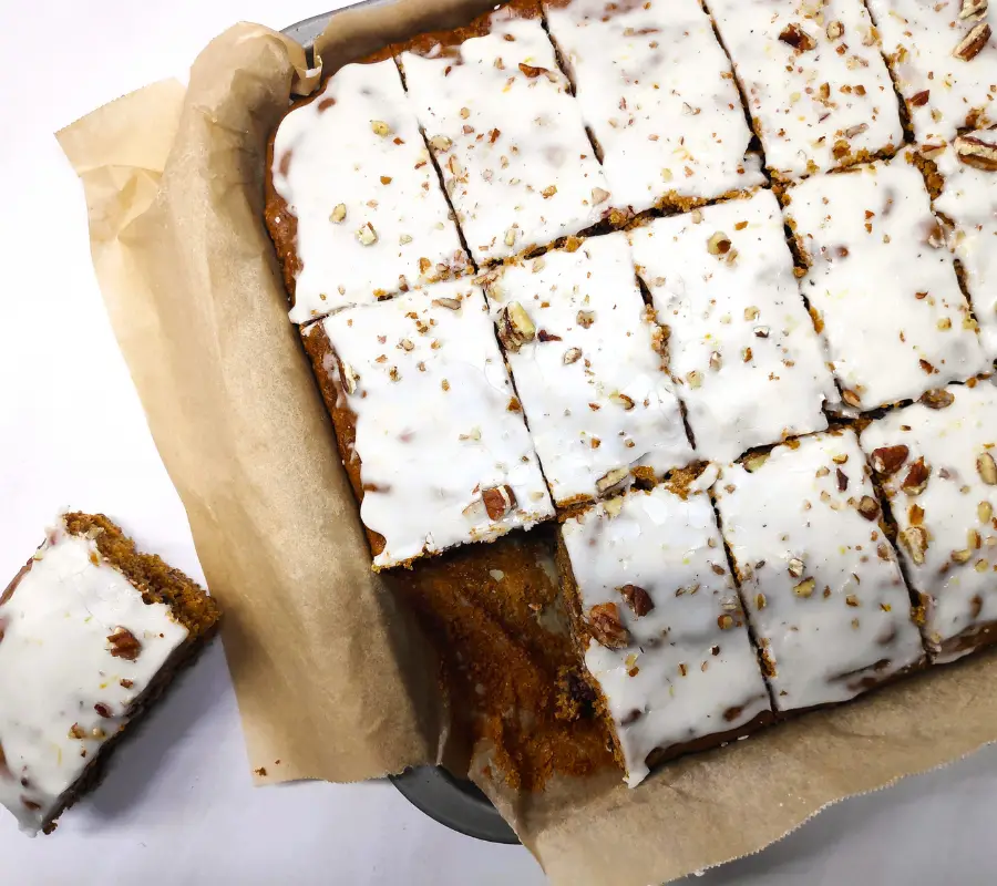 iced date and pecan traybake cute into squares