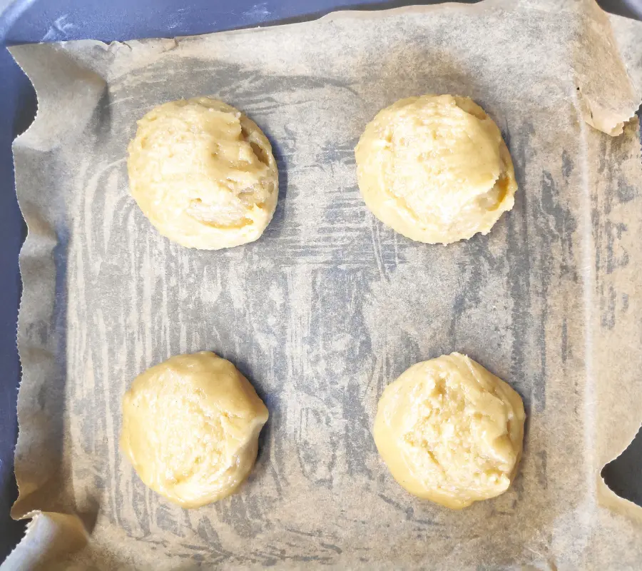 ginger biscuit dough balls in baking tray