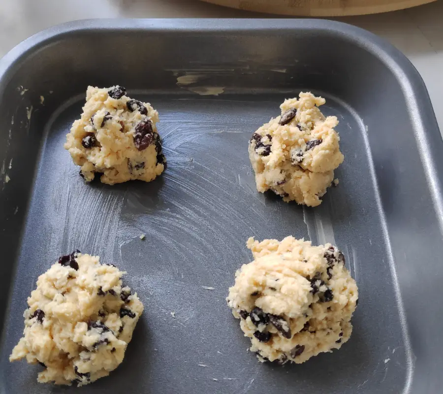 unbaked four rock cakes in a baking tray
