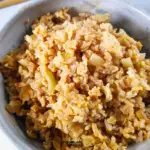 homemade egg fried rice in a grey bowl