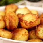 flour coated crispy potatoes in a bowl