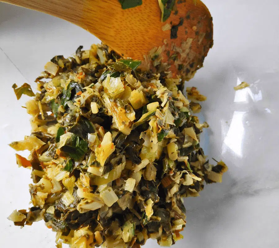 chard pie filling mixed in a bowl