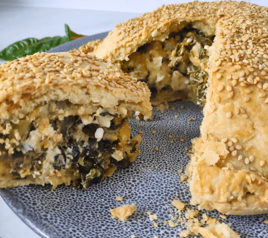 chard pie on a grey plate