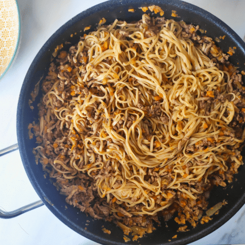 ork mince noodles in a large pan
