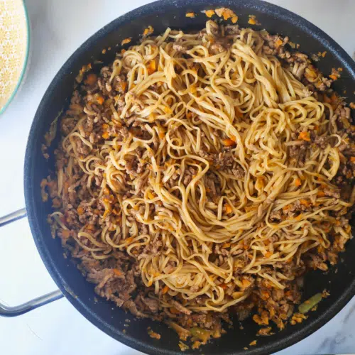 ork mince noodles in a large pan