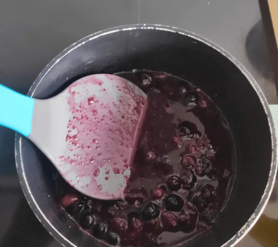 heated blueberries in a pan