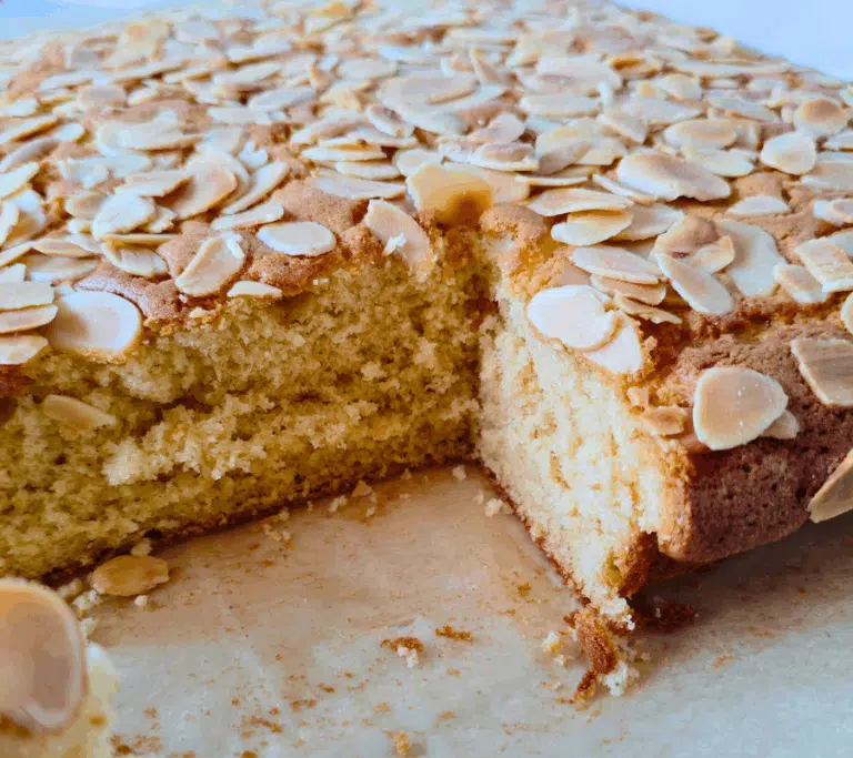 ginger cake traybake topped with flaked almonds
