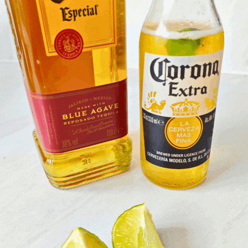 bottle of beer, tequila and lime to make homemade desperados