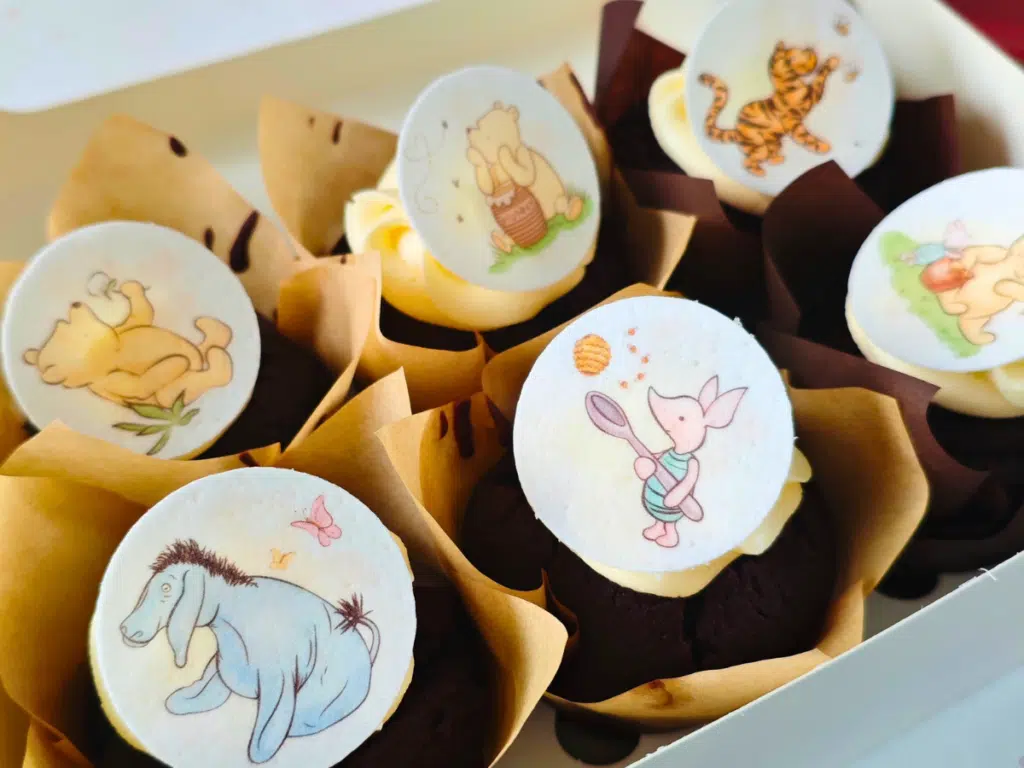a box of six winnie the pooh cupcakes